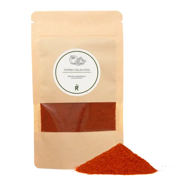 Das Bild zeigt einen Haufen Paprika delikatess vor einer Verpackung.